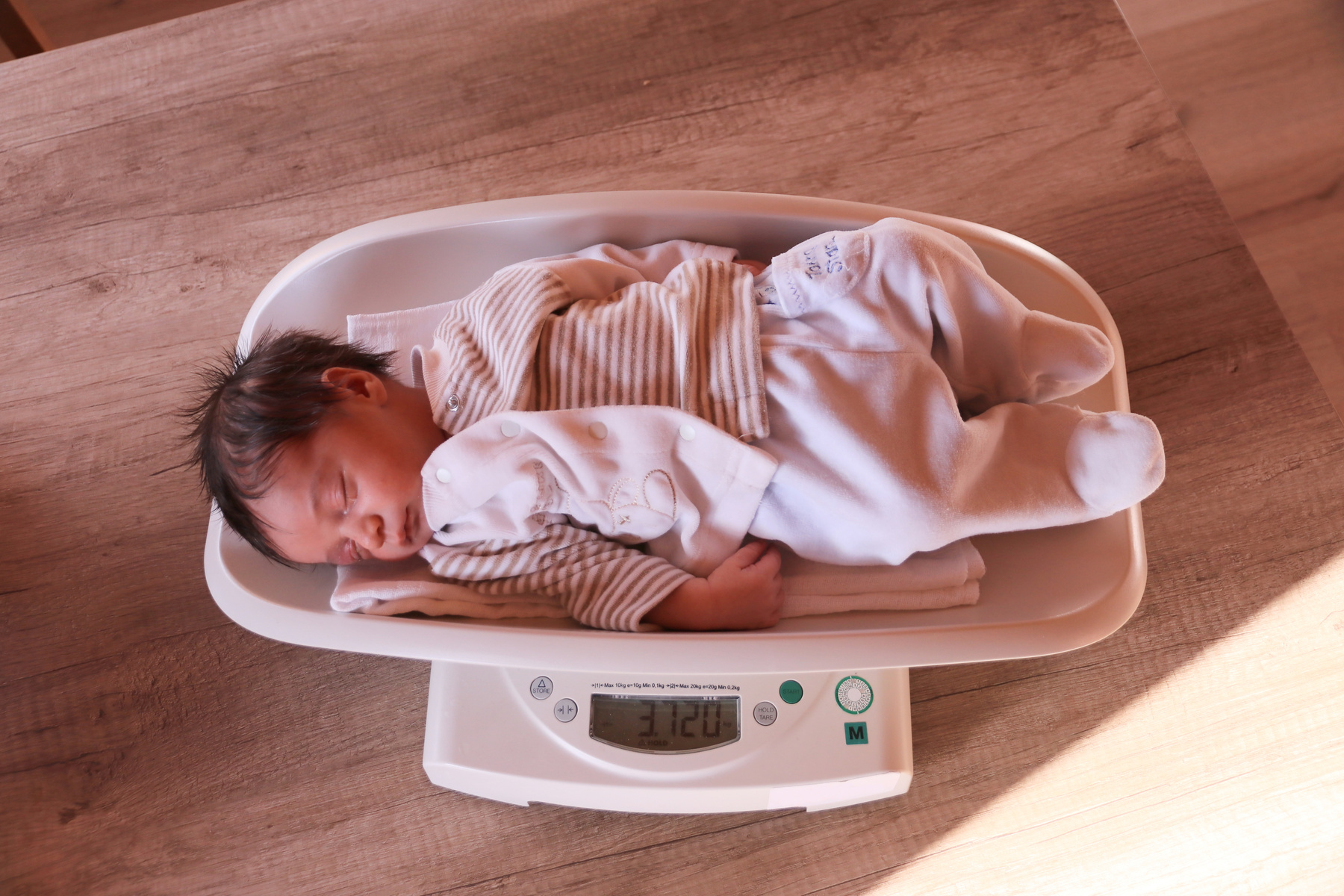 Weighting Baby Boy On Scale